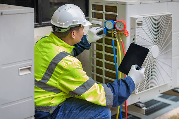Professional Emergency Hvac technician working in Rexburg, ID